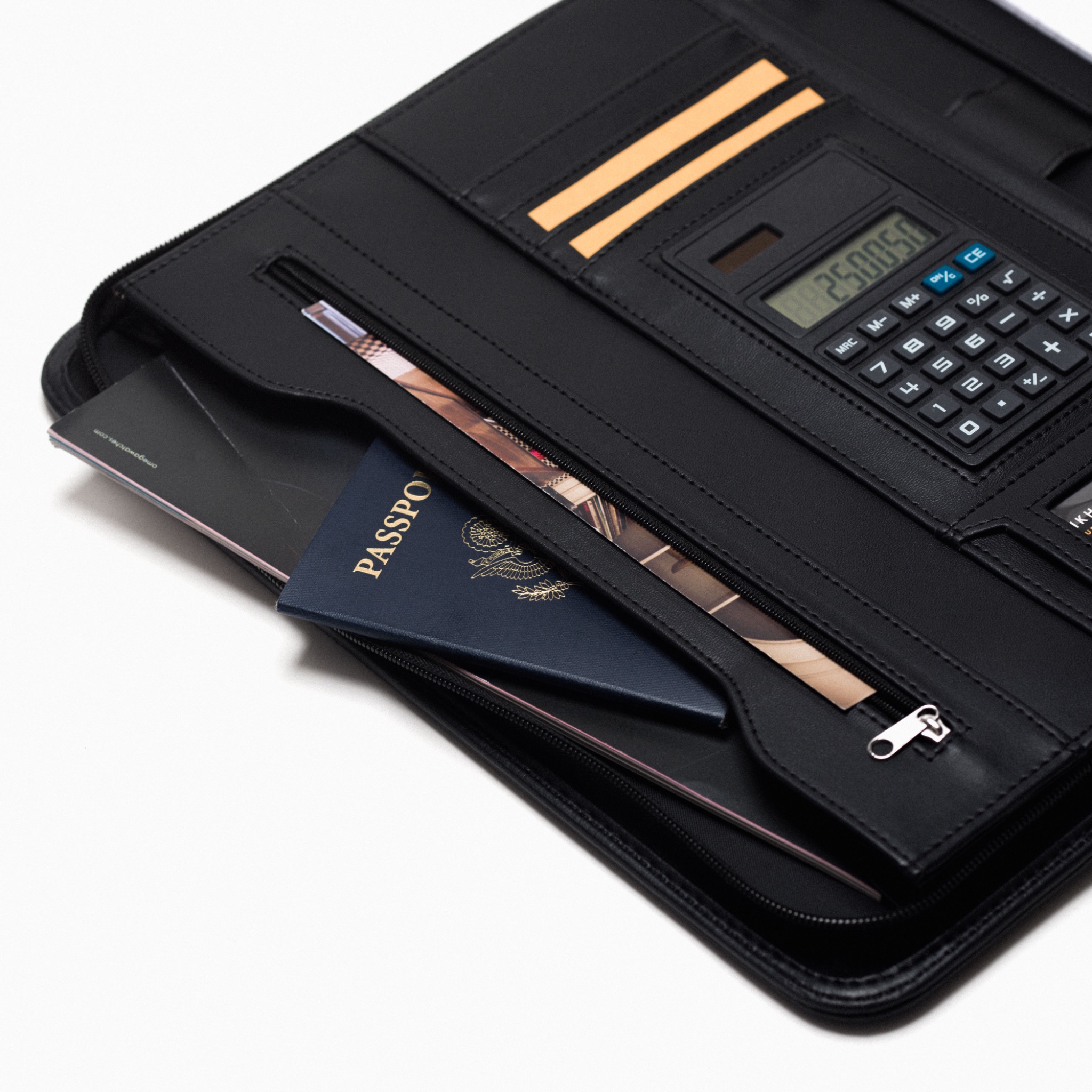 Cossini leather padfolio photographed on white